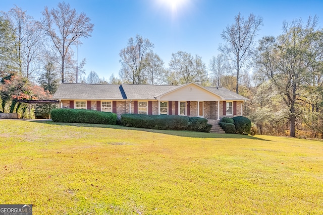 ranch-style house with a front yard