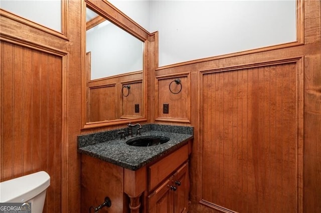 bathroom with vanity and toilet