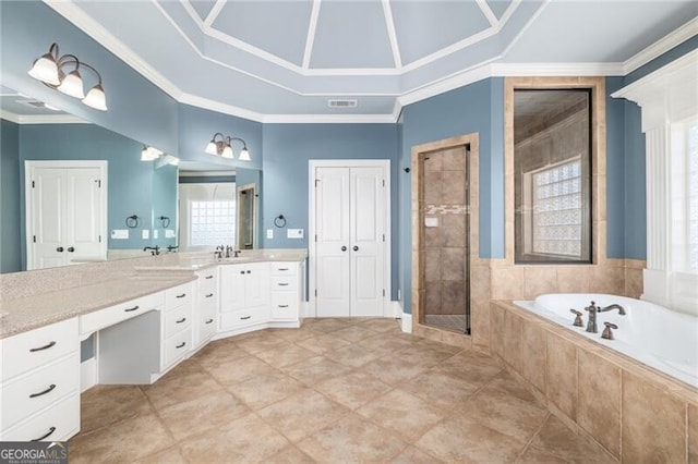 bathroom featuring plenty of natural light, vanity, ornamental molding, and shower with separate bathtub