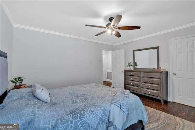 bedroom with ceiling fan, crown molding, and dark wood-type flooring