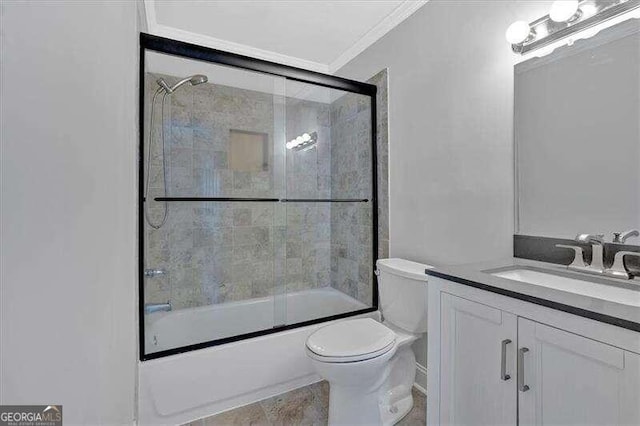 full bathroom featuring vanity, ornamental molding, toilet, and bath / shower combo with glass door