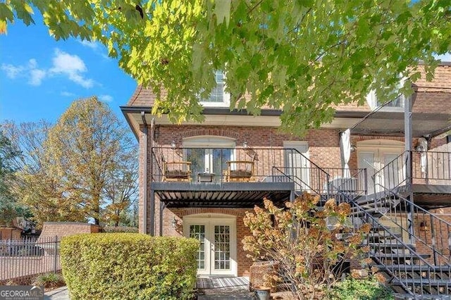 back of property with french doors