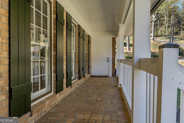 view of patio featuring a porch