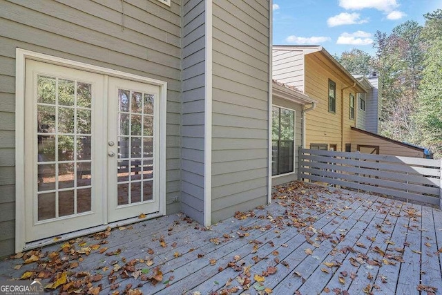 wooden deck featuring french doors