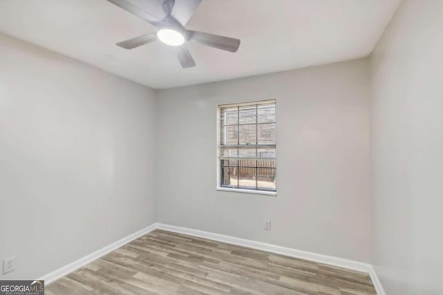 unfurnished room featuring light hardwood / wood-style floors and ceiling fan