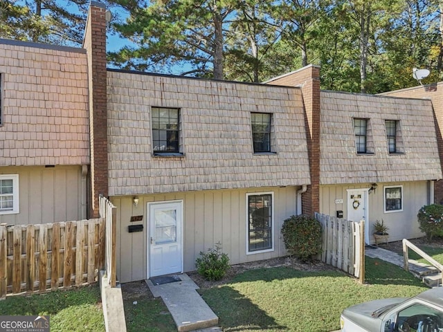 view of property with a front yard