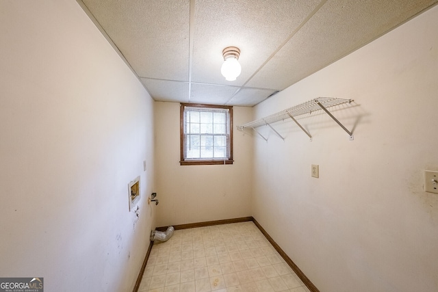 laundry room with hookup for an electric dryer and hookup for a washing machine