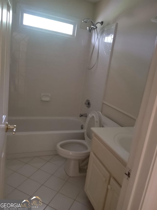 full bathroom featuring tile patterned flooring, vanity, toilet, and shower / washtub combination