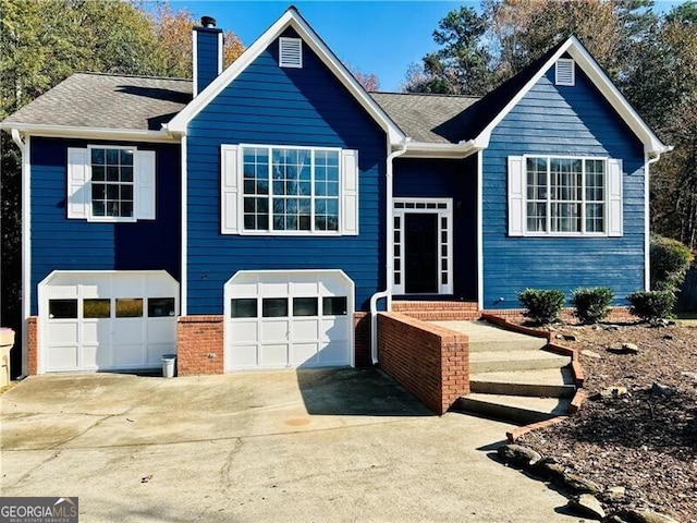 view of front of property featuring a garage