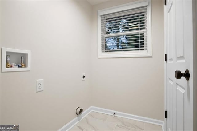 clothes washing area with hookup for an electric dryer and hookup for a washing machine