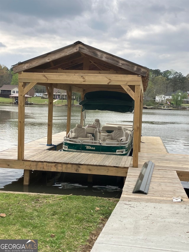 view of dock with a water view