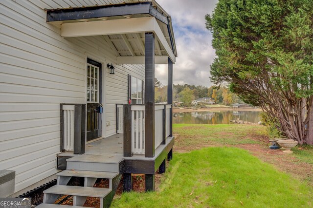 exterior space with a water view