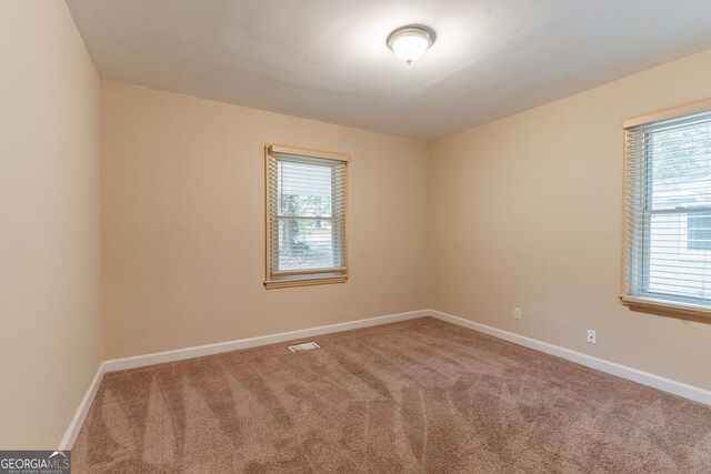 view of carpeted spare room