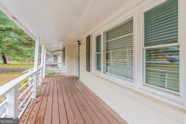 wooden terrace with covered porch