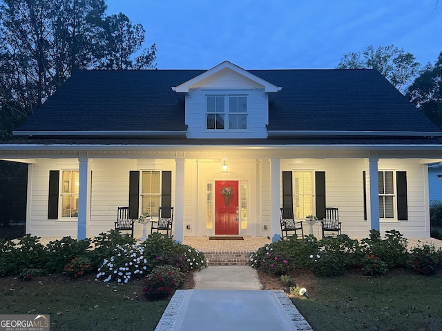 view of front of property featuring covered porch