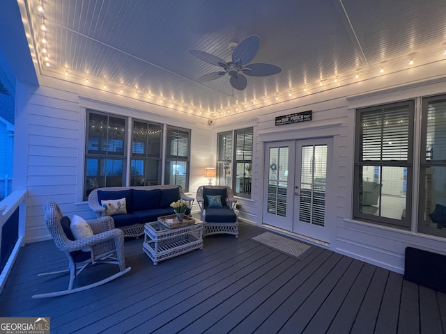 wooden deck featuring an outdoor hangout area, french doors, and ceiling fan