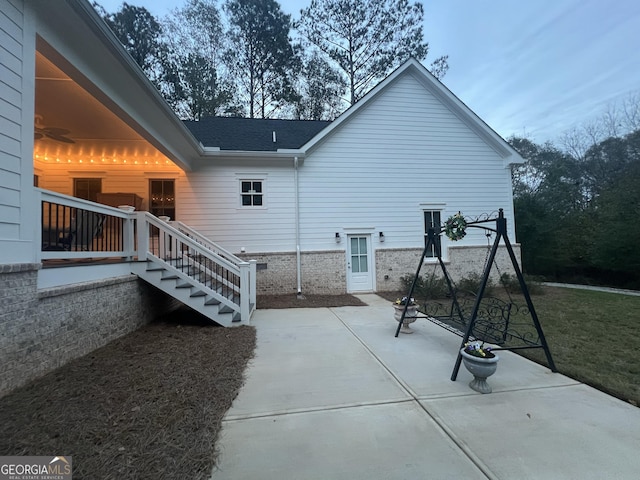 back of property featuring a patio