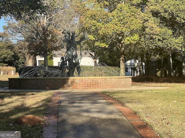 exterior space featuring a lawn