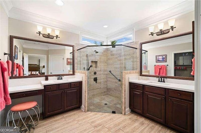 bathroom featuring crown molding, a shower with door, vanity, and hardwood / wood-style floors