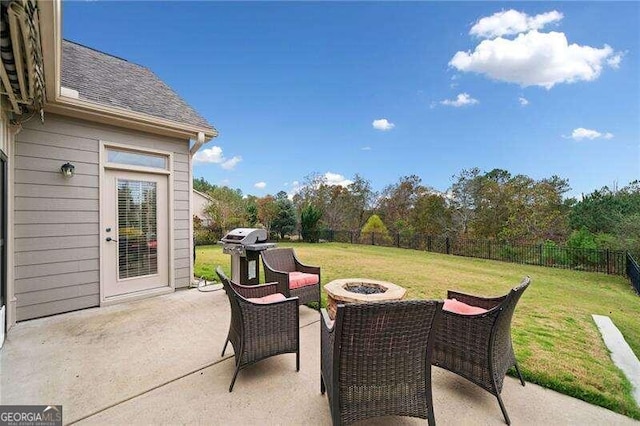 view of patio with grilling area and an outdoor fire pit