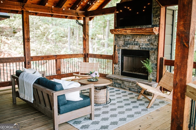 exterior space featuring a stone fireplace