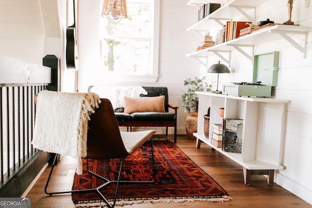 interior space featuring radiator and hardwood / wood-style floors