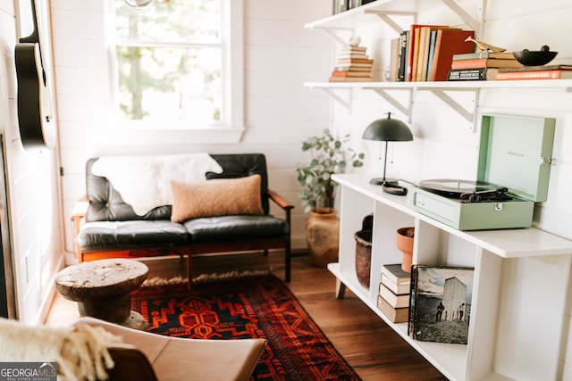 sitting room featuring hardwood / wood-style flooring