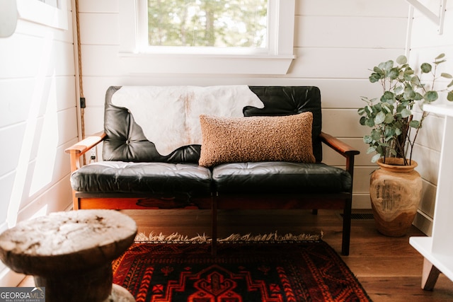 living area featuring hardwood / wood-style floors