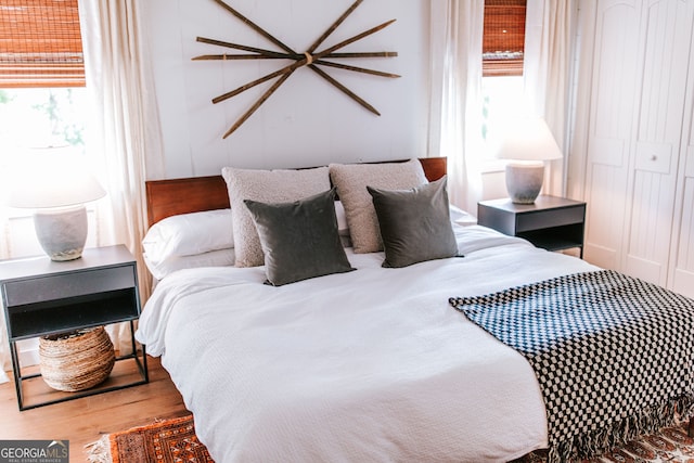 bedroom featuring wood-type flooring