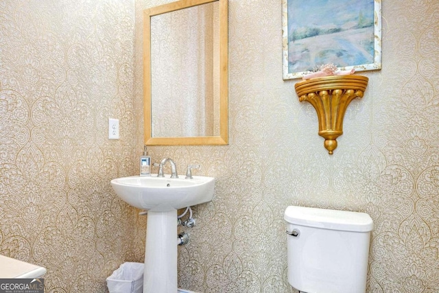 bathroom featuring toilet