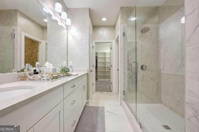 bathroom featuring vanity and walk in shower