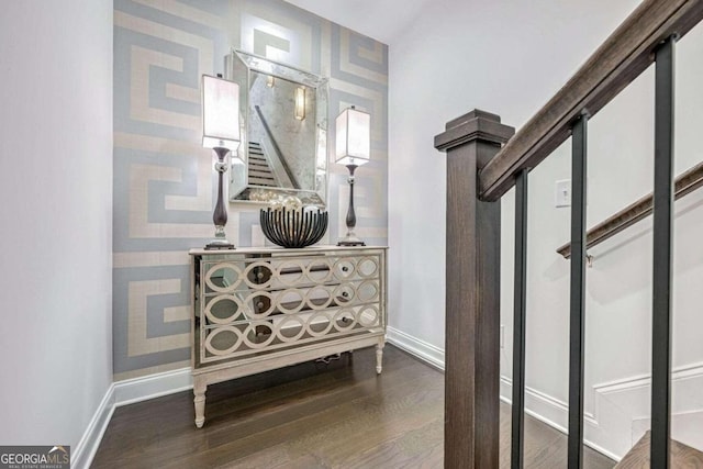 hall with dark hardwood / wood-style flooring