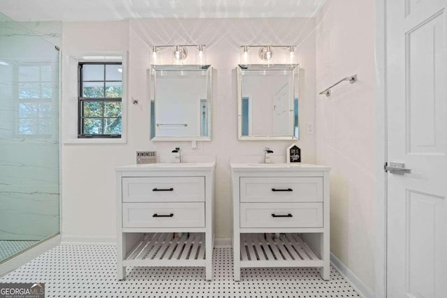 bathroom with vanity and a shower with door