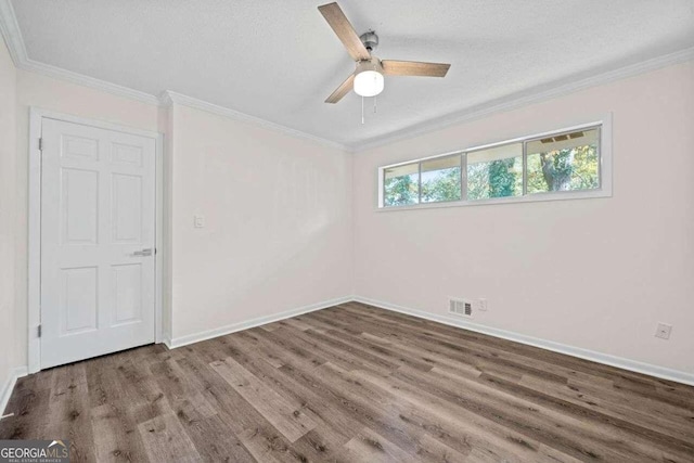 unfurnished room with hardwood / wood-style flooring, ceiling fan, crown molding, and a textured ceiling