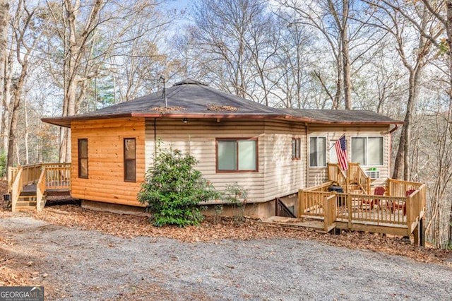 view of front of house with a deck