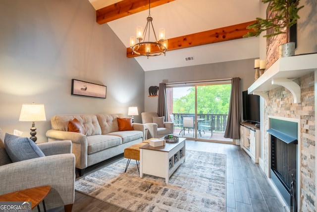 living room featuring beam ceiling, dark hardwood / wood-style flooring, an inviting chandelier, and high vaulted ceiling