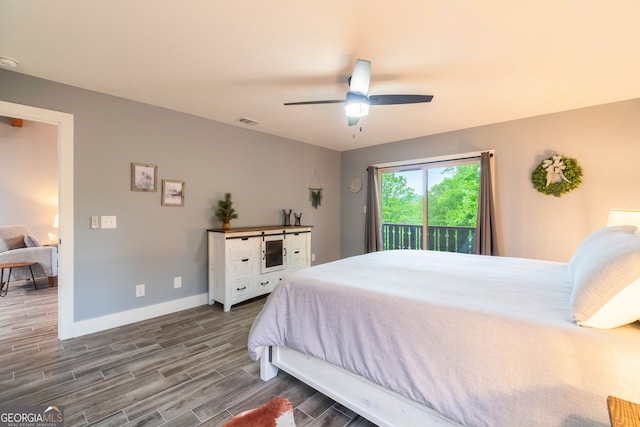 bedroom featuring ceiling fan, access to exterior, and wood-type flooring