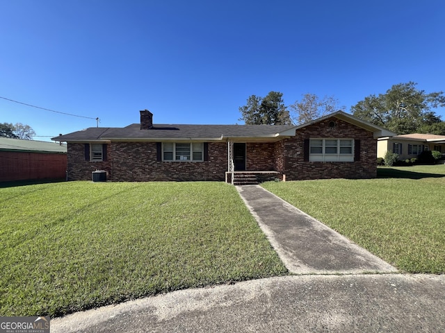 106 Country Club Rd, Dublin, GA 31021 - single story home with a front yard and a chimney