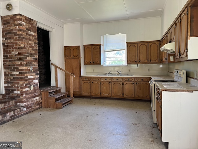 106 Country Club Rd, Dublin, GA 31021 - kitchen featuring white range with electric stovetop, ventilation hood, light countertops, and brown cabinetry