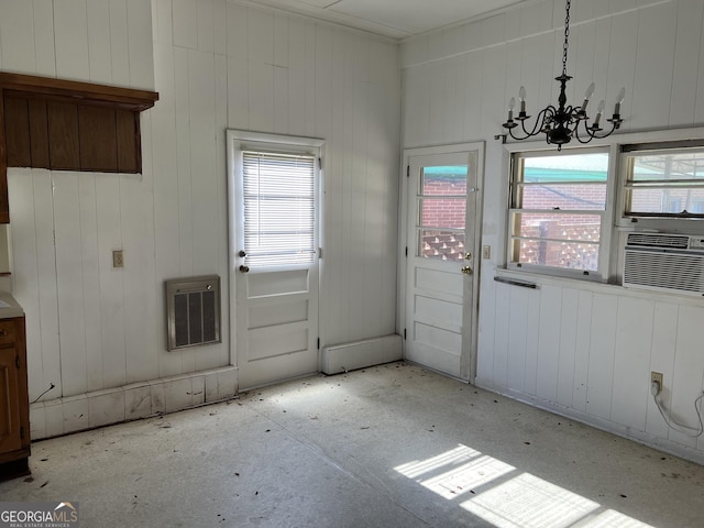 106 Country Club Rd, Dublin, GA 31021 - unfurnished dining area featuring a chandelier and cooling unit