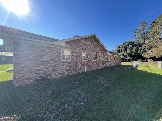 106 Country Club Rd, Dublin, GA 31021 - view of property exterior featuring brick siding