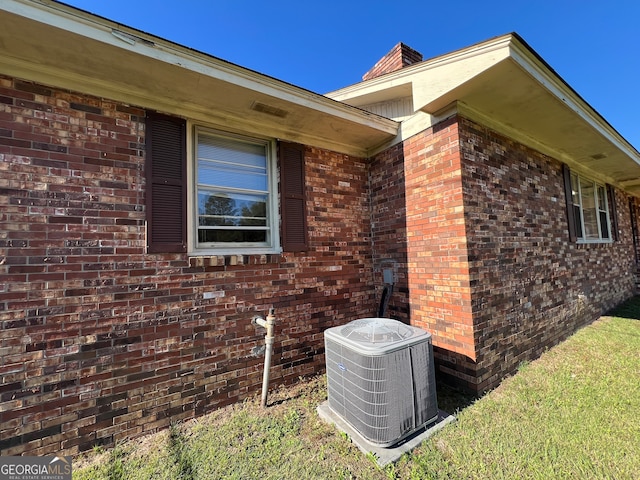 view of home's exterior featuring cooling unit