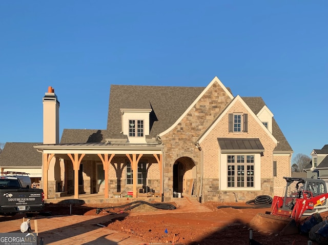 view of front facade featuring covered porch