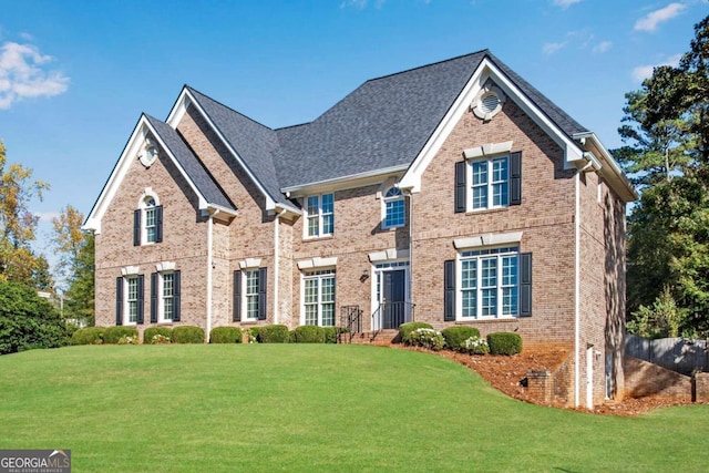 view of property featuring a front yard