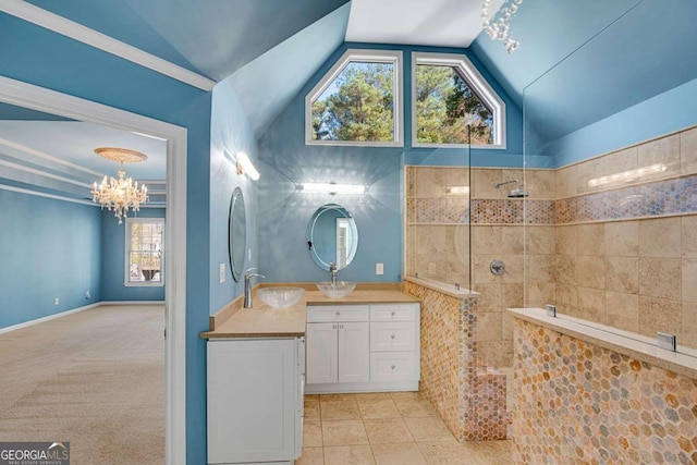 bathroom featuring tile patterned floors, vanity, vaulted ceiling, a shower, and a chandelier