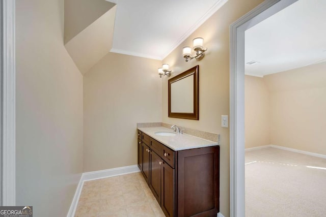 bathroom with vanity and ornamental molding