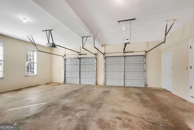 garage featuring a garage door opener