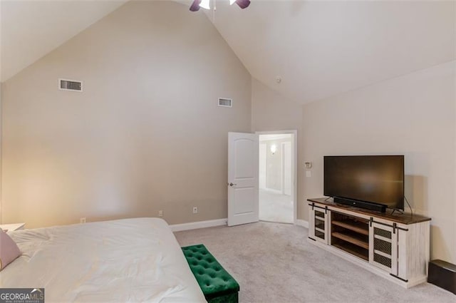 bedroom featuring light colored carpet, high vaulted ceiling, and ceiling fan