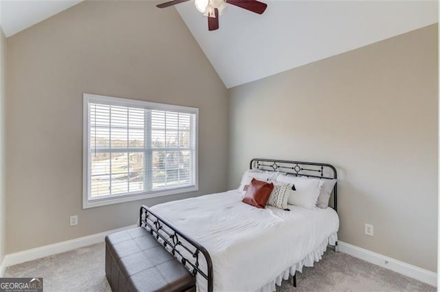 bedroom with ceiling fan, light colored carpet, and high vaulted ceiling