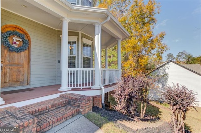 entrance to property with a porch